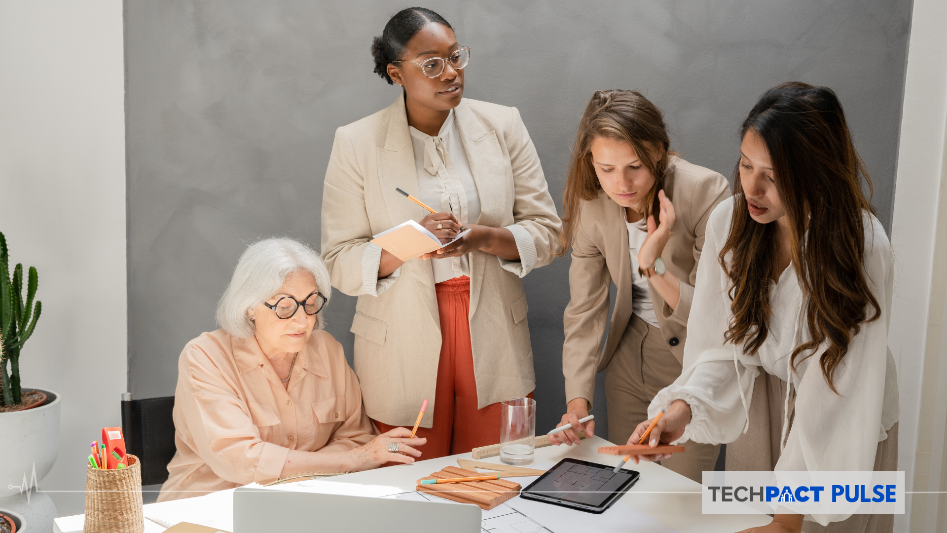 Diverse women working together on a conference table